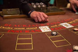 JILI live-dealer baccarat table showing dealer, cards, and betting interface on petatoto wap